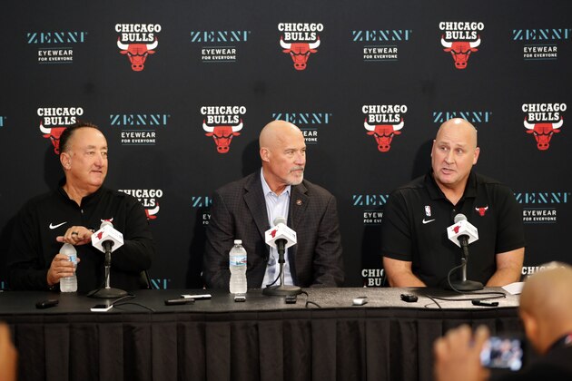 Chicago Bulls' executives Gar Forman, left, and John Paxson, center, listen to head coach Jim Boyle during the NBA basketball team's media day Monday, Sept. 30, 2019, in Chicago. (AP Photo/Charles Rex Arbogast)