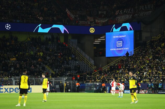 DORTMUND, GERMANY - DECEMBER 10: VAR checks Slavia Praha's first goal during the UEFA Champions League group F match between Borussia Dortmund and Slavia Praha at Signal Iduna Park on December 10, 2019 in Dortmund, Germany. (Photo by Lars Baron/Getty Images)