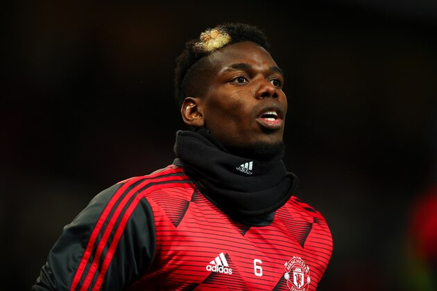 MANCHESTER, ENGLAND - DECEMBER 26: Paul Pogba of Manchester United warms up during the Premier League match between Manchester United and Newcastle United at Old Trafford on December 26, 2019 in Manchester, United Kingdom. (Photo by Robbie Jay Barratt - AMA/Getty Images) MANCHESTER, ENGLAND - DECEMBER 26: Paul Pogba of Manchester United warms up during the Premier League match between Manchester United and Newcastle United at Old Trafford on December 26, 2019 in Manchester, United Kingdom. (Photo by Robbie Jay Barratt - AMA/Getty Images)
