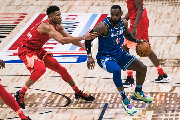 CHICAGO, ILLINOIS - FEBRUARY 16: LeBron James #2 of Team LeBron handles the ball against Giannis Antetokounmpo #24 of Team Giannis during the 69th NBA All-Star Game on February 16, 2020 at the United Center in Chicago, Illinois. (Photo by Lampson Yip - Clicks Images/Getty Images)