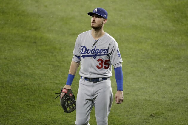 Los Angeles Dodgers center fielder Cody Bellinger looks on during the fourth inning of Game 4 of a baseball National League Division Series against the Washington Nationals Monday, Oct. 7, 2019, in Washington. (AP Photo/Julio Cortez)