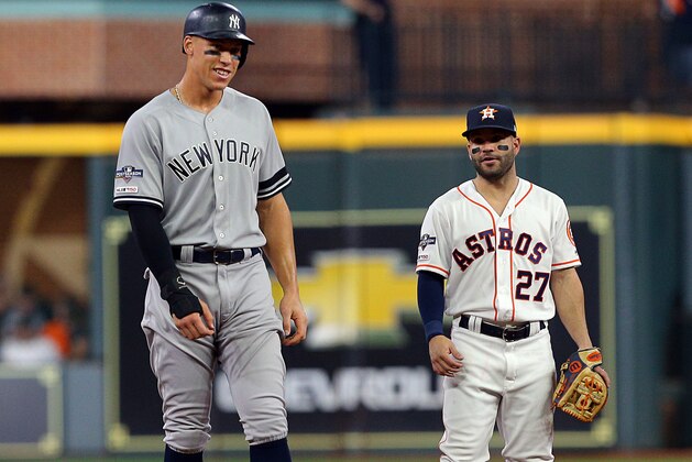 HOUSTON, TEXAS - OCTOBER 19: Aaron Judge #99 of the New York Yankees and Jose Altuve #27 of the Houston Astros talk during Game 6 of the American League Championship Series at Minute Maid Park on October 19, 2019 in Houston, Texas. (Photo by Bob Levey/Getty Images) HOUSTON, TEXAS - OCTOBER 19: Aaron Judge #99 of the New York Yankees and Jose Altuve #27 of the Houston Astros talk during Game 6 of the American League Championship Series at Minute Maid Park on October 19, 2019 in Houston, Texas. (Photo by Bob Levey/Getty Images)