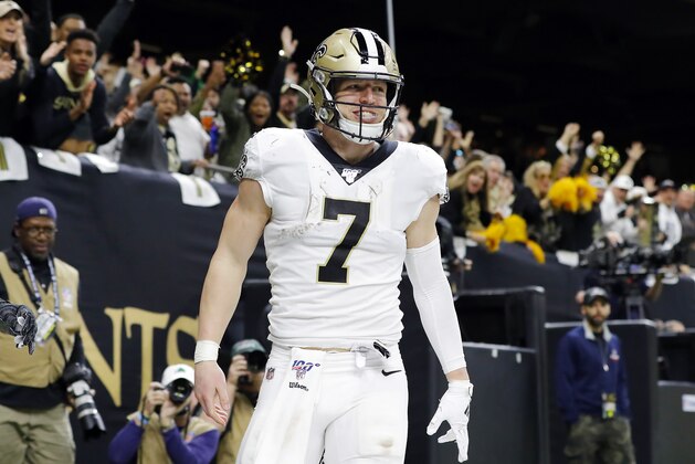 NEW ORLEANS, LOUISIANA - JANUARY 05: Taysom Hill #7 of the New Orleans Saints celebrates after catching a touchdown pass during the fourth quarter against the Minnesota Vikings in the NFC Wild Card Playoff game at Mercedes Benz Superdome on January 05, 2020 in New Orleans, Louisiana. (Photo by Kevin C. Cox/Getty Images)