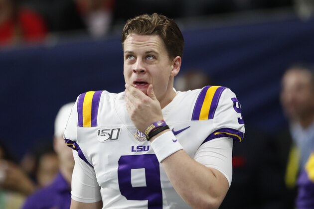 LSU quarterback Joe Burrow (9) wams up before the first half of the Southeastern Conference championship NCAA college football game between LSU and Georgia, Saturday, Dec. 7, 2019, in Atlanta. (AP Photo/John Bazemore)