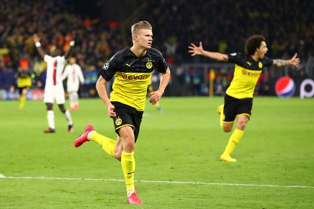DORTMUND, GERMANY - FEBRUARY 18: Erling Braut Haaland of Borussia Dortmund celebrates scoring his side's second goal during the UEFA Champions League round of 16 first leg match between Borussia Dortmund and Paris Saint-Germain at Signal Iduna Park on February 18, 2020 in Dortmund, Germany. (Photo by Chris Brunskill/Fantasista/Getty Images)
