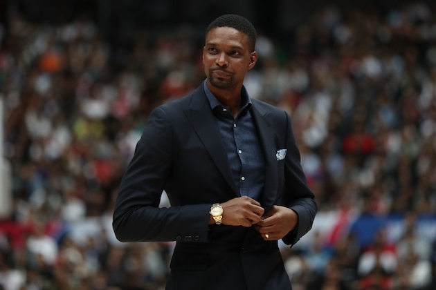 SAITAMA, JAPAN - OCTOBER 10: Retired NBA player Chris Bosh looks on during the preseason game between Toronto Raptors and Houston Rockets at Saitama Super Arena on October 10, 2019 in Saitama, Japan. NOTE TO USER: User expressly acknowledges and agrees that, by downloading and/or using this photograph, user is consenting to the terms and conditions of the Getty Images License Agreement. (Photo by Takashi Aoyama/Getty Images)