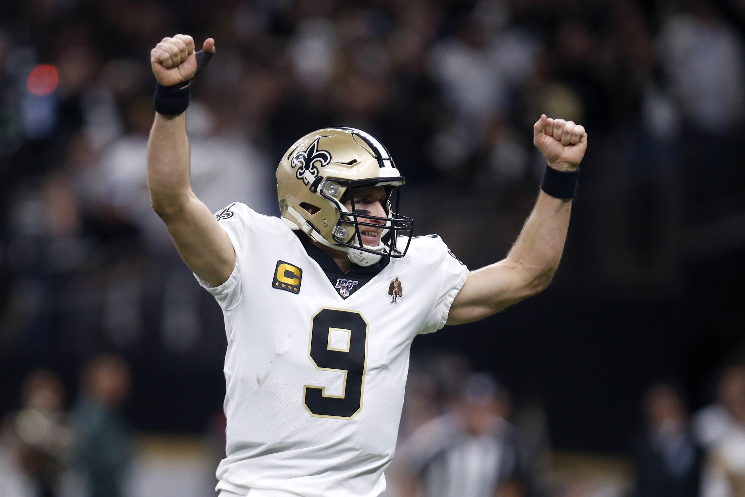 New Orleans Saints quarterback Drew Brees (9) celebrates a touchdown carry by Alvin Kamara in the first half of an NFL wild-card playoff football game against the Minnesota Vikings, Sunday, Jan. 5, 2020, in New Orleans. (AP Photo/Butch Dill) New Orleans Saints quarterback Drew Brees (9) celebrates a touchdown carry by Alvin Kamara in the first half of an NFL wild-card playoff football game against the Minnesota Vikings, Sunday, Jan. 5, 2020, in New Orleans. (AP Photo/Butch Dill)