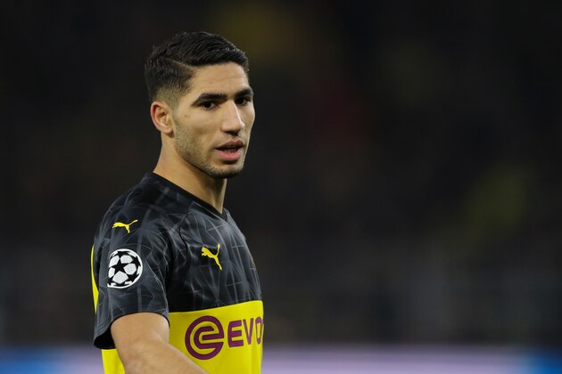 DORTMUND, GERMANY - FEBRUARY 18: Achraf Hakimi of Borussia Dortmund during the UEFA Champions League round of 16 first leg match between Borussia Dortmund and Paris Saint-Germain at Signal Iduna Park on February 18, 2020 in Dortmund, Germany. (Photo by Matthew Ashton - AMA/Getty Images)