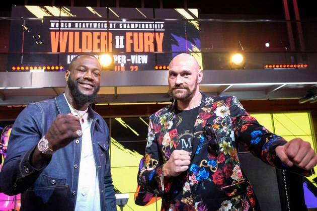 Boxers Deontay Wilder (L) and Tyson Fury (R) face-off during a press conference in Los Angeles, California on January 25, 2020, ahead of their re-match fight in Las Vegas on February 22. (Photo by RINGO CHIU / AFP) (Photo by RINGO CHIU/AFP via Getty Images)