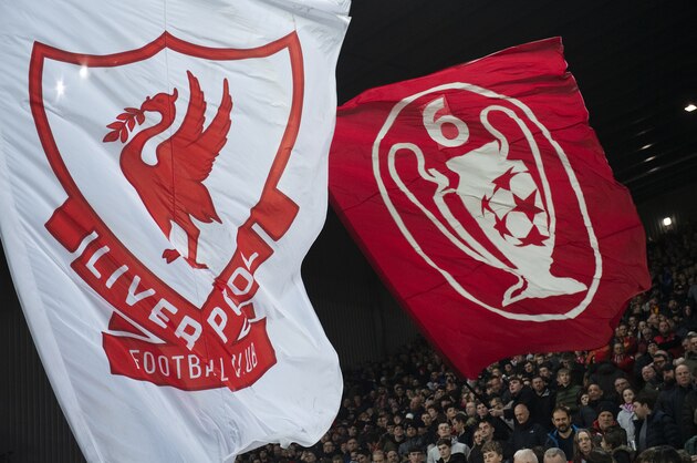 LIVERPOOL, ENGLAND - FEBRUARY 04:  Liverpool fans wave flags and banners before the FA Cup Fourth Round Replay match between Liverpool and Shrewsbury Town at Anfield on February 4, 2020 in Liverpool, England. (Photo by Visionhaus)