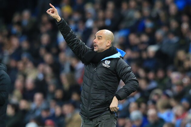 Manchester City's Spanish manager Pep Guardiola gestures on the touchline during the English Premier League football match between Manchester City and West Ham United at the Etihad Stadium in Manchester, north west England, on February 19, 2020. (Photo by Lindsey Parnaby / AFP) / RESTRICTED TO EDITORIAL USE. No use with unauthorized audio, video, data, fixture lists, club/league logos or 'live' services. Online in-match use limited to 120 images. An additional 40 images may be used in extra time. No video emulation. Social media in-match use limited to 120 images. An additional 40 images may be used in extra time. No use in betting publications, games or single club/league/player publications. /  (Photo by LINDSEY PARNABY/AFP via Getty Images)