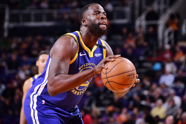 PHOENIX, AZ - FEBRUARY 12: Draymond Green #23 of the Golden State Warriors shoots a free throw during the game against the Phoenix Suns on February 12, 2020 at Talking Stick Resort Arena in Phoenix, Arizona. NOTE TO USER: User expressly acknowledges and agrees that, by downloading and or using this photograph, user is consenting to the terms and conditions of the Getty Images License Agreement. Mandatory Copyright Notice: Copyright 2020 NBAE (Photo by Michael Gonzales/NBAE via Getty Images)