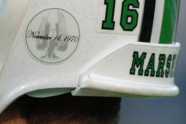 A decal honoring the Memorial Fountain at Marshall University's student center adorns quarterback Jimmy Skinner's helmet Saturday, Nov. 19, 2005, in Huntington, W.Va. This year is the 35th anniversary of the crash of a chartered plane that took the lives of 75 players, coaches, staff members, community supporters and the flight crew returning from Marshall's game at East Carolina. Players are wearing the decals in memory of the lives lost. (AP Photo/Jeff Gentner)