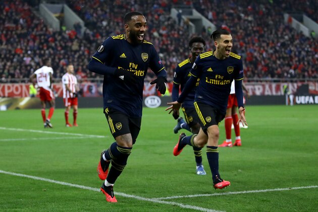 PIRAEUS, GREECE - FEBRUARY 20: Alexandre Lacazette of Arsenal celebrates after scoring his teams first goal during the UEFA Europa League round of 32 first leg match between Olympiacos FC and Arsenal FC at Karaiskakis Stadium on February 20, 2020 in Piraeus, Greece. (Photo by Richard Heathcote/Getty Images)