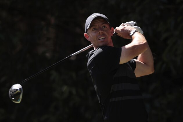 Rory McIlroy of Northern Ireland follows his ball after striking it at the second tee off during the first round of the WGC-Mexico Championship golf tournament, at the Chapultepec Golf Club in Mexico City, Mexico City, Thursday, Feb. 20, 2020.(AP Photo/Fernando Llano)