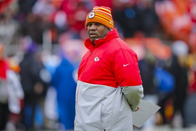 KANSAS CITY, MO - JANUARY 12: Kansas City Chiefs offensive coordinator Eric Bieniemy watches pregame warmups prior to the AFC Divisional playoff game against the Houston Texans at Arrowhead Stadium on January 12, 2020 in Kansas City, Missouri. (Photo by David Eulitt/Getty Images)