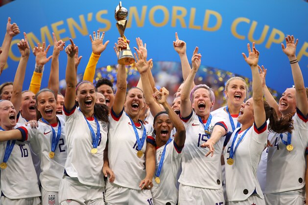 LYON, FRANCE - JULY 07: Carli Lloyd of the USA lifts the trophy as USA celebrate victory during the 2019 FIFA Women's World Cup France Final match between The United State of America and The Netherlands at Stade de Lyon on July 07, 2019 in Lyon, France. (Photo by Richard Heathcote/Getty Images)