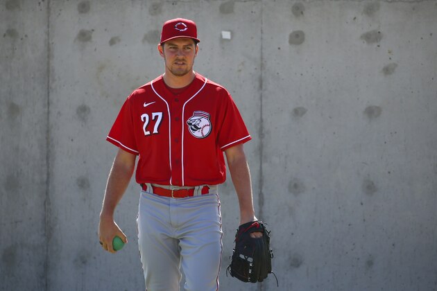 Cincinnati Reds starting pitcher Trevor Bauer walks to his next drill station during spring training baseball workouts Monday, Feb. 17, 2020, in Goodyear, Ariz. (AP Photo/Ross D. Franklin)