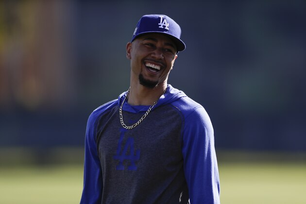 Los Angeles Dodgers right fielder Mookie Betts reacts during spring training baseball Wednesday, Feb. 19, 2020, in Phoenix. (AP Photo/Gregory Bull) Los Angeles Dodgers right fielder Mookie Betts reacts during spring training baseball Wednesday, Feb. 19, 2020, in Phoenix. (AP Photo/Gregory Bull)
