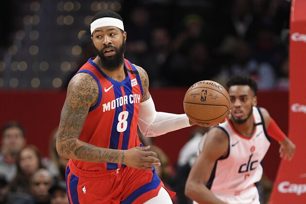 Detroit Pistons forward Markieff Morris (8) handles the ball during the first half of an NBA basketball game against the Washington Wizards, Monday, Jan. 20, 2020, in Washington. (AP Photo/Nick Wass)