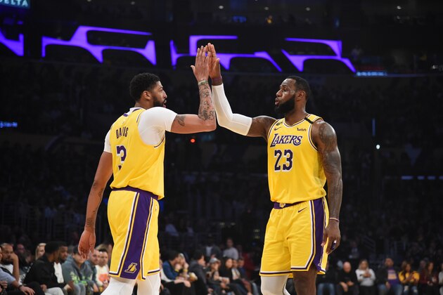 LOS ANGELES, CA - FEBRUARY 21: Anthony Davis #3 of the Los Angeles Lakers and LeBron James #23 of the Los Angeles Lakers high-five during game against the Memphis Grizzlies on February 21, 2020 at STAPLES Center in Los Angeles, California. NOTE TO USER: User expressly acknowledges and agrees that, by downloading and/or using this Photograph, user is consenting to the terms and conditions of the Getty Images License Agreement. Mandatory Copyright Notice: Copyright 2020 NBAE (Photo by Adam Pantozzi/NBAE via Getty Images) LOS ANGELES, CA - FEBRUARY 21: Anthony Davis #3 of the Los Angeles Lakers and LeBron James #23 of the Los Angeles Lakers high-five during game against the Memphis Grizzlies on February 21, 2020 at STAPLES Center in Los Angeles, California. NOTE TO USER: User expressly acknowledges and agrees that, by downloading and/or using this Photograph, user is consenting to the terms and conditions of the Getty Images License Agreement. Mandatory Copyright Notice: Copyright 2020 NBAE (Photo by Adam Pantozzi/NBAE via Getty Images)