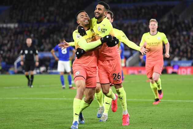 LEICESTER, ENGLAND - FEBRUARY 22: Gabriel Jesus of Manchester City celebrates with Riyad Mahrez after scoring his team's first goal during the Premier League match between Leicester City and Manchester City at The King Power Stadium on February 22, 2020 in Leicester, United Kingdom. (Photo by Laurence Griffiths/Getty Images)