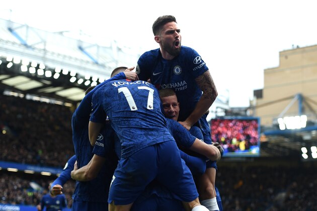 LONDON, ENGLAND - FEBRUARY 22: Marcos Alonso of Chelsea celebrates with teammates after scoring his team's second goal during the Premier League match between Chelsea FC and Tottenham Hotspur at Stamford Bridge on February 22, 2020 in London, United Kingdom. (Photo by Harriet Lander/Copa/Getty Images)
