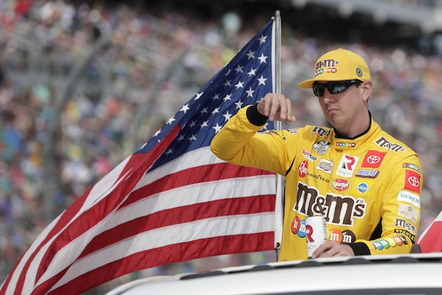 Kyle Busch takes a parade lap in front of fans before the NASCAR Daytona 500 auto race at Daytona International Speedway, Sunday, Feb. 16, 2020, in Daytona Beach, Fla. (AP Photo/John Raoux) Kyle Busch takes a parade lap in front of fans before the NASCAR Daytona 500 auto race at Daytona International Speedway, Sunday, Feb. 16, 2020, in Daytona Beach, Fla. (AP Photo/John Raoux)