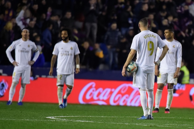 Real Madrid's players react after Levante´s scored a goal during the Spanish league football match Levante UD against Real Madrid CF at the Ciutat de Valencia stadium in Valencia on February 22, 2020. (Photo by JOSE JORDAN / AFP) (Photo by JOSE JORDAN/AFP via Getty Images)