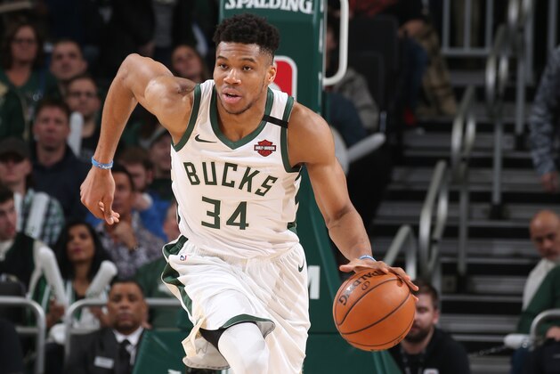 MILWAUKEE, WI - FEBRUARY 22: Giannis Antetokounmpo #34 of the Milwaukee Bucks handles the ball against the Philadelphia 76ers on February 22, 2020 at the Fiserv Forum in Milwaukee, Wisconsin. NOTE TO USER: User expressly acknowledges and agrees that, by downloading and or using this photograph, user is consenting to the terms and conditions of the Getty Images License Agreement.  Mandatory Copyright Notice: Copyright 2020 NBAE (Photo by Gary Dineen/NBAE via Getty Images)