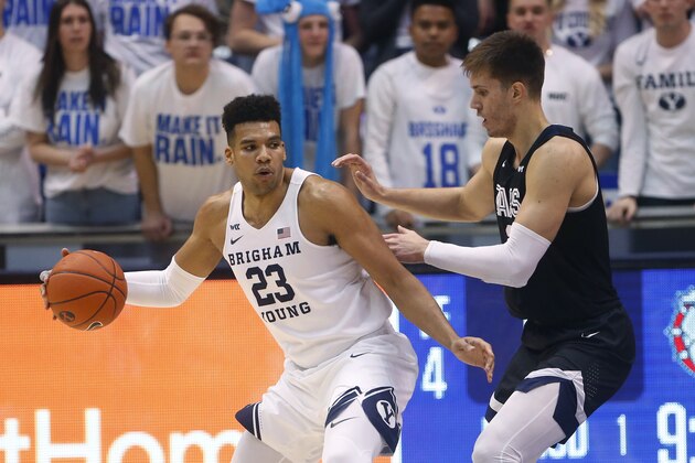 Gonzaga forward Filip Petrusev, right, guards BYU forward Yoeli Childs (23) during the first half of an NCAA college basketball game Saturday, Feb. 22, 2020, in Provo, Utah. (AP Photo/Rick Bowmer)