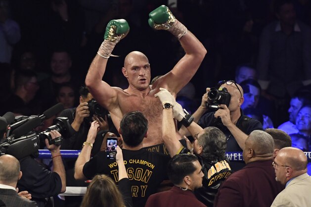 LAS VEGAS, NV - FEBRUARY 22: Tyson Fury cheers after going 7 rounds with Deontay Wilder at the MGM Grand Hotel February 22, 2020 in Las Vegas, Nevada. Las Vegas NV. Tyson Fury took the win by win TKO in the 7th round as the towel was thrown in from Wilder's corner for the world heavyweight championship in Las Vegas, Nevada. (Photo by MB Media/Getty Images) LAS VEGAS, NV - FEBRUARY 22: Tyson Fury cheers after going 7 rounds with Deontay Wilder at the MGM Grand Hotel February 22, 2020 in Las Vegas, Nevada. Las Vegas NV. Tyson Fury took the win by win TKO in the 7th round as the towel was thrown in from Wilder's corner for the world heavyweight championship in Las Vegas, Nevada. (Photo by MB Media/Getty Images)