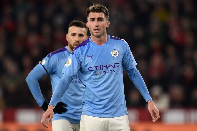 Manchester City's French defender Aymeric Laporte (R) reacts during the English Premier League football match between Sheffield United and Manchester City at Bramall Lane in Sheffield, northern England on January 21, 2020. (Photo by Oli SCARFF / AFP) / RESTRICTED TO EDITORIAL USE. No use with unauthorized audio, video, data, fixture lists, club/league logos or 'live' services. Online in-match use limited to 120 images. An additional 40 images may be used in extra time. No video emulation. Social media in-match use limited to 120 images. An additional 40 images may be used in extra time. No use in betting publications, games or single club/league/player publications. /  (Photo by OLI SCARFF/AFP via Getty Images)