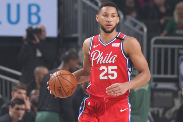 MILWAUKEE, WI - FEBRUARY 22: Ben Simmons #25 of the Philadelphia 76ers handles the ball against the Milwaukee Bucks on February 22, 2020 at the Fiserv Forum in Milwaukee, Wisconsin. NOTE TO USER: User expressly acknowledges and agrees that, by downloading and or using this photograph, user is consenting to the terms and conditions of the Getty Images License Agreement.  Mandatory Copyright Notice: Copyright 2020 NBAE (Photo by Gary Dineen/NBAE via Getty Images)