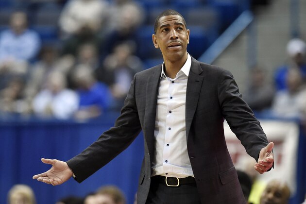 FILE - In this Feb. 15, 2018, file photo, Connecticut head coach Kevin Ollie reacts during the second half an NCAA college basketball game against Tulsa in Hartford, Conn. UConn will find out what penalties it faces for violations of NCAA rules in its basketball program under former coach Kevin Ollie. The NCAA Division I Committee on Infractions plans to release its report Tuesday, July 2, 2019. (AP Photo/Jessica Hill, File)