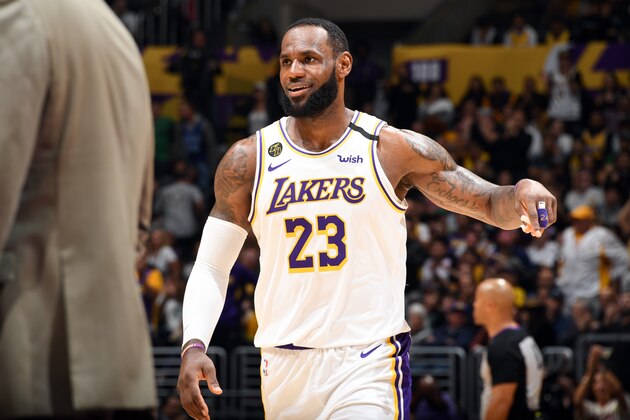 LOS ANGELES, CA - FEBRUARY 23: LeBron James #23 of the Los Angeles Lakers reacts to a play during the game against the Boston Celtics on February 23, 2020 at STAPLES Center in Los Angeles, California. NOTE TO USER: User expressly acknowledges and agrees that, by downloading and/or using this Photograph, user is consenting to the terms and conditions of the Getty Images License Agreement. Mandatory Copyright Notice: Copyright 2020 NBAE (Photo by Andrew D. Bernstein/NBAE via Getty Images)