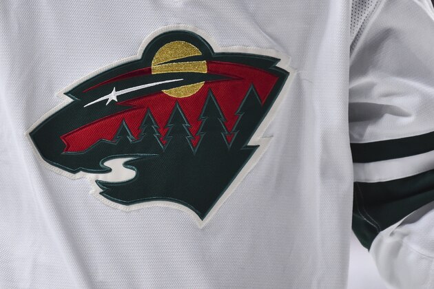 MONTREAL, QC - OCTOBER 17:  A detail of the Minnesota Wild logo is seen during the first period against the Montreal Canadiens at the Bell Centre on October 17, 2019 in Montreal, Canada.  The Montreal Canadiens defeated the Minnesota Wild 4-0.  (Photo by Minas Panagiotakis/Getty Images)