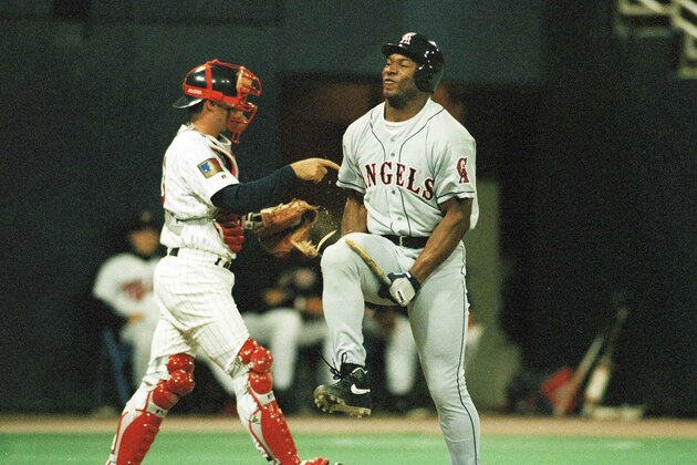 Bo Jackson of the California Angels breaks bat over his knee after striking out in the fourth inning against the Minnesota Twins in Minneapolis, April 6, 1994.  (AP Photo/Jim Mone)