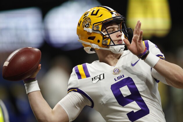 LSU quarterback Joe Burrow (9) wams up before the first half of the Southeastern Conference championship NCAA college football game between LSU and Georgia, Saturday, Dec. 7, 2019, in Atlanta. (AP Photo/John Bazemore)