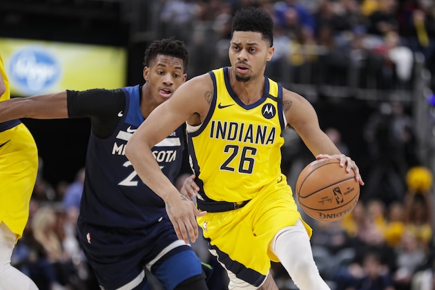 Indiana Pacers guard Jeremy Lamb (26) drives on Minnesota Timberwolves guard Jarrett Culver (23) during the second half of an NBA basketball game in Indianapolis, Friday, Jan. 17, 2020. The Pacers defeated the Minnesota Timberwolves 116-114. (AP Photo/Michael Conroy)