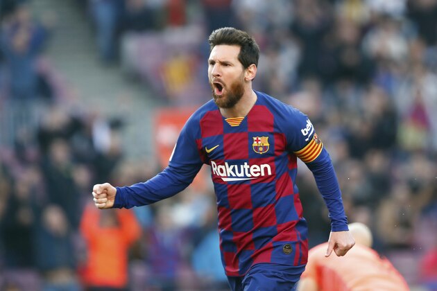 Barcelona's Lionel Messi celebrates after scoring his side's opening goal during a Spanish La Liga soccer match between Barcelona and Eibar at the Camp Nou stadium in Barcelona, Spain, Saturday Feb. 22, 2020. (AP Photo/Joan Monfort)