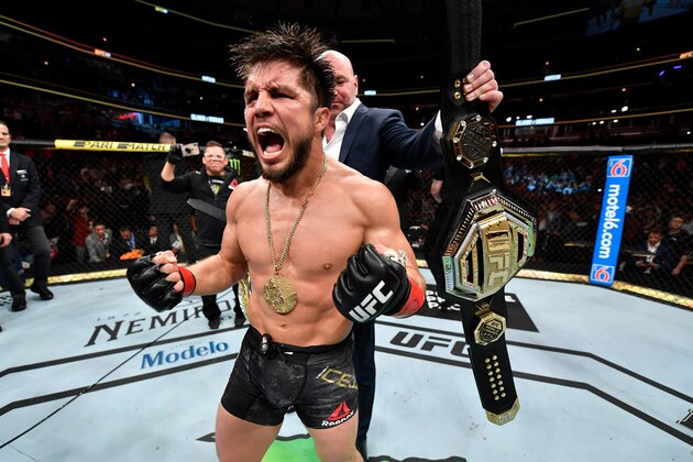 CHICAGO, IL - JUNE 08:  Henry Cejudo celebrates his TKO victory over Marlon Moraes of Brazil in their bantamweight championship bout during the UFC 238 event at the United Center on June 8, 2019 in Chicago, Illinois. (Photo by Jeff Bottari/Zuffa LLC/Zuffa LLC via Getty Images)