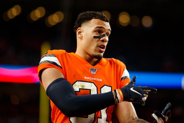 DENVER, CO - DECEMBER 22:  Safety Justin Simmons #31 of the Denver Broncos talks with Safety Will Parks #34 of the Denver Broncos during the fourth quarter against the Detroit Lions at Empower Field at Mile High on December 22, 2019 in Denver, Colorado. The Broncos defeated the Lions 27-17. (Photo by Justin Edmonds/Getty Images)