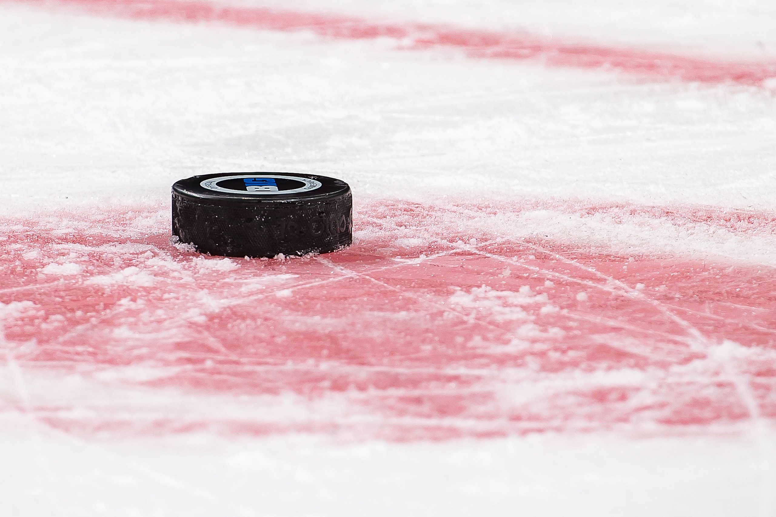 DETROIT, MI - FEBRUARY 17: A game puck sits on the ice on a play stoppage during the second period of the annual NCAA hockey game between the Michigan Wolverines and the Michigan State Spartans during the Duel in the D at Little Caesars Arena on February 17, 2020 in Detroit, Michigan. The Wolverines defeated the Spartans 4-1. (Photo by Dave Reginek/Getty Images)