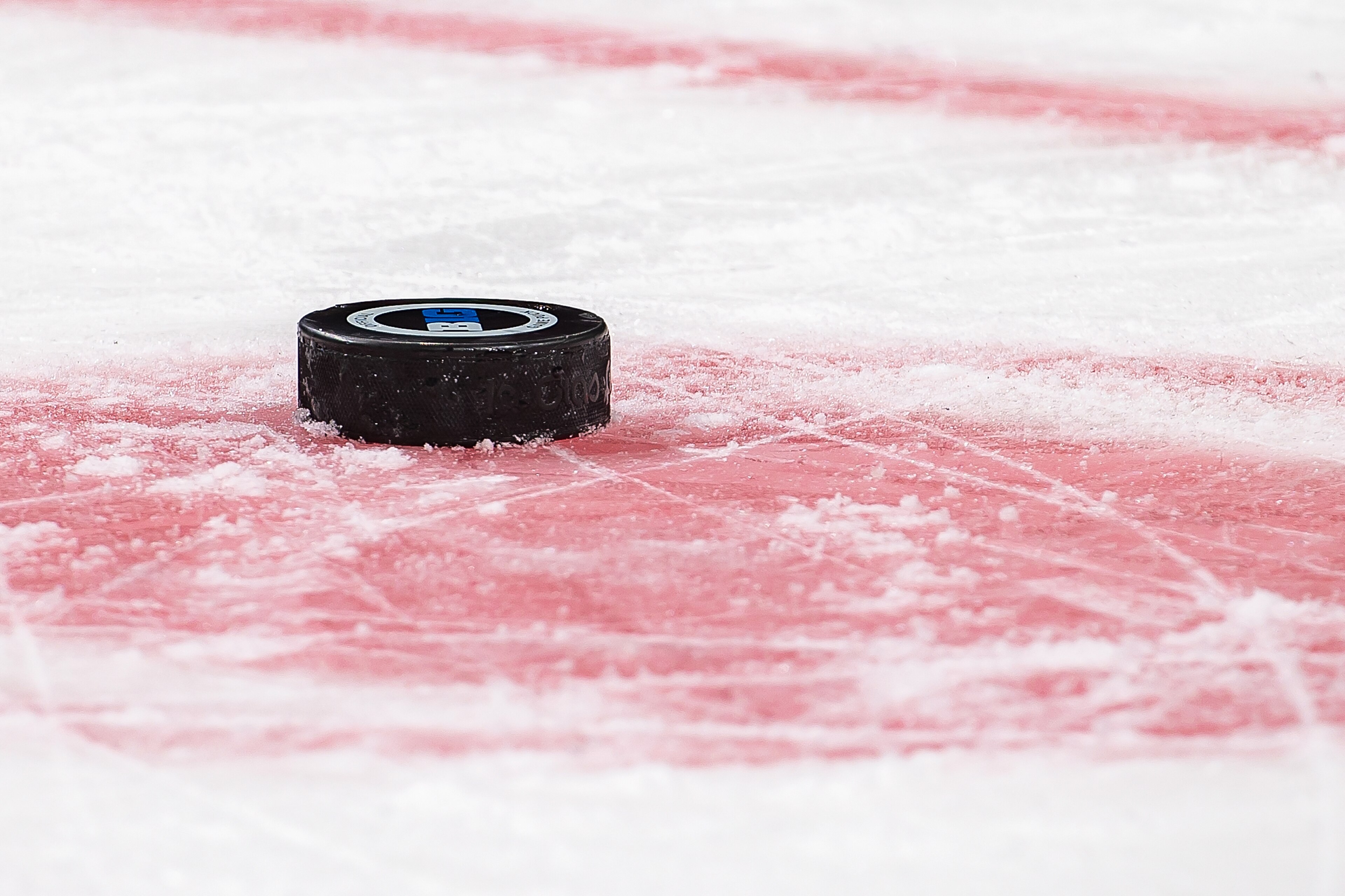 DETROIT, MI - FEBRUARY 17: A game puck sits on the ice on a play stoppage during the second period of the annual NCAA hockey game between the Michigan Wolverines and the Michigan State Spartans during the Duel in the D at Little Caesars Arena on February 17, 2020 in Detroit, Michigan. The Wolverines defeated the Spartans 4-1. (Photo by Dave Reginek/Getty Images)