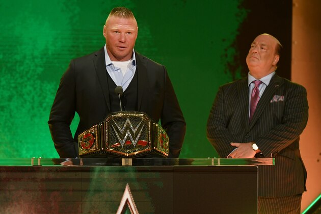 LAS VEGAS, NEVADA - OCTOBER 11:  WWE champion Brock Lesnar (L) speaks during a WWE news conference as his advocate Paul Heyman looks on at T-Mobile Arena on October 11, 2019 in Las Vegas, Nevada. Lesnar will face former UFC heavyweight champion Cain Velasquez and WWE wrestler Braun Strowman will take on heavyweight boxer Tyson Fury at the WWE's Crown Jewel event at Fahd International Stadium in Riyadh, Saudi Arabia on October 31.  (Photo by Ethan Miller/Getty Images)