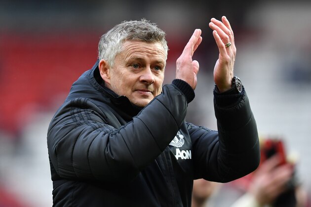 Manchester United's Norwegian manager Ole Gunnar Solskjaer applauds at the end of the English Premier League football match between Manchester United and Watford at Old Trafford in Manchester, north west England, on February 23, 2020. (Photo by Paul ELLIS / AFP) / RESTRICTED TO EDITORIAL USE. No use with unauthorized audio, video, data, fixture lists, club/league logos or 'live' services. Online in-match use limited to 120 images. An additional 40 images may be used in extra time. No video emulation. Social media in-match use limited to 120 images. An additional 40 images may be used in extra time. No use in betting publications, games or single club/league/player publications. /  (Photo by PAUL ELLIS/AFP via Getty Images)