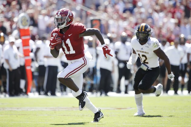TUSCALOOSA, AL - SEPTEMBER 21: Henry Ruggs III #11 of the Alabama Crimson Tide runs for a 45-yard touchdown in the first quarter after catching a pass behind D.Q. Thomas #12 of the Southern Mississippi Golden Eagles at Bryant-Denny Stadium on September 21, 2019 in Tuscaloosa, Alabama. (Photo by Joe Robbins/Getty Images)
