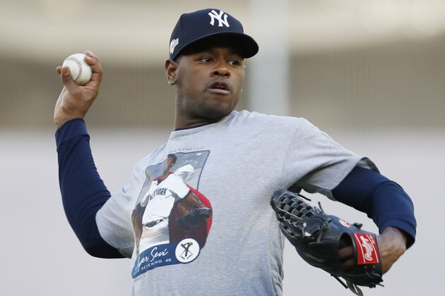 New York Yankees starting pitcher Luis Severino practices on flat ground, Monday, Oct. 14, 2019, at Yankee Stadium in New York, on an off day during the American League Championship Series between the New York Yankees and the Houston Astros. (AP Photo/Kathy Willens)