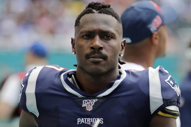 FILE - In this  Sept. 15, 2019, file photo, New England Patriots wide receiver Antonio Brown (17) on the sidelines, during the first half at an NFL football game against the Miami Dolphins in Miami Gardens, Fla. NFL free agent Antonio Brown turned himself in at a Florida jail on Thursday night, Jan, 24, 2020, following accusations that he and his trainer attacked another man. (AP Photo/Lynne Sladky, File)